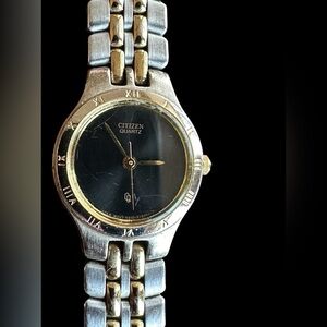 Citizen ladies two-tone black face watch with Roman numerals bezel